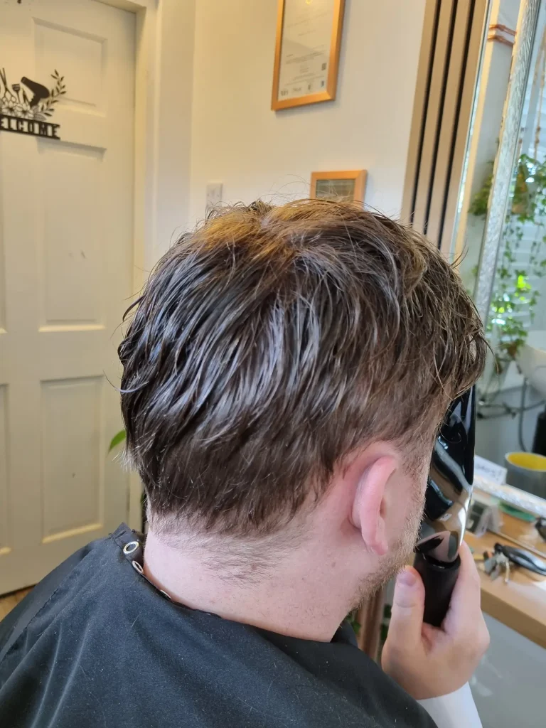 Clarity Hair Solutions client with a new bespoke hair system from the back.
